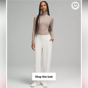Lululemon Wundermost Ultra-Soft Nulu Turtleneck Bodysuit in taupe Sz L‎